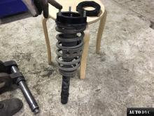 Installing a set of spacers to increase the ground clearance Kia Opirus Lift Kits (leveling kits and coil spring spacer\strut spacer)