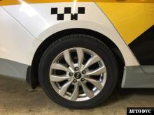 Installing a set of spacers to increase the ground clearance Kia Optima Lift Kits (leveling kits and coil spring spacer\strut spacer)