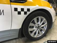 Installing a set of spacers to increase the ground clearance Kia Optima Lift Kits (leveling kits and coil spring spacer\strut spacer)