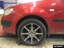 Installing a set of spacers to increase the ground clearance Kia Rio II Lift Kits (leveling kits and coil spring spacer\strut spacer)