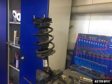 Installing a set of spacers to increase the ground clearance Kia Cerato III Lift Kits (leveling kits and coil spring spacer\strut spacer)