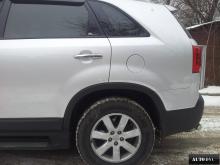 Installing a set of spacers to increase the ground clearance Kia Sorento II Lift Kits (leveling kits and coil spring spacer\strut spacer)
