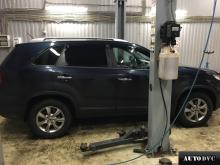 Installing a set of spacers to increase the ground clearance Kia Sorento Lift Kits (leveling kits and coil spring spacer\strut spacer)