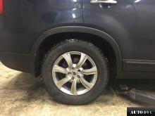 Installing a set of spacers to increase the ground clearance Kia Sorento Lift Kits (leveling kits and coil spring spacer\strut spacer)