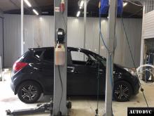 Installing a set of spacers to increase the ground clearance Kia Venga Lift Kits (leveling kits and coil spring spacer\strut spacer)