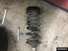 Installing a set of spacers to increase the ground clearance Land Rover Discovery 3 Lift Kits (leveling kits and coil spring spacer\strut spacer)
