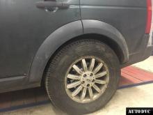 Installing a set of spacers to increase the ground clearance Land Rover Discovery 3 Lift Kits (leveling kits and coil spring spacer\strut spacer)