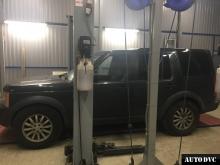 Installing a set of spacers to increase the ground clearance Land Rover Discovery 3 Lift Kits (leveling kits and coil spring spacer\strut spacer)