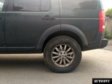 Installing a set of spacers to increase the ground clearance Land Rover Discovery 3 Lift Kits (leveling kits and coil spring spacer\strut spacer)