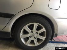 Installing a set of spacers to increase the ground clearance Mitsubishi Carisma Lift Kits (leveling kits and coil spring spacer\strut spacer)