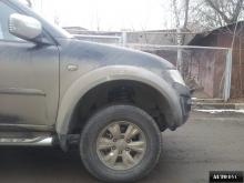 Installing a set of spacers to increase the ground clearance Mitsubishi L200 Lift Kits (leveling kits and coil spring spacer\strut spacer)