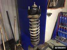 Installing a set of spacers to increase the ground clearance Mitsubishi Lancer Lift Kits (leveling kits and coil spring spacer\strut spacer)