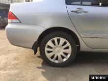 Installing a set of spacers to increase the ground clearance Mitsubishi Lancer IX Lift Kits (leveling kits and coil spring spacer\strut spacer)