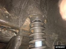 Installing a set of spacers to increase the ground clearance Mitsubishi Outlander I Lift Kits (leveling kits and coil spring spacer\strut spacer)