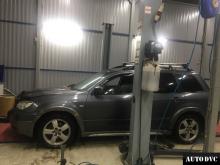 Installing a set of spacers to increase the ground clearance Mitsubishi Outlander I Lift Kits (leveling kits and coil spring spacer\strut spacer)