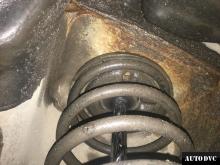 Installing a set of spacers to increase the ground clearance Mitsubishi Outlander I Lift Kits (leveling kits and coil spring spacer\strut spacer)