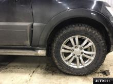 Installing a set of spacers to increase the ground clearance Mitsubishi Pajero Sport II Lift Kits (leveling kits and coil spring spacer\strut spacer)