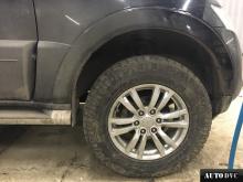 Installing a set of spacers to increase the ground clearance Mitsubishi Pajero Sport II Lift Kits (leveling kits and coil spring spacer\strut spacer)