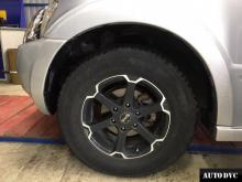 Installing a set of spacers to increase the ground clearance Mitsubishi Pajero III Lift Kits (leveling kits and coil spring spacer\strut spacer)