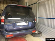 Installing a set of spacers to increase the ground clearance Mitsubishi Pajero III Lift Kits (leveling kits and coil spring spacer\strut spacer)