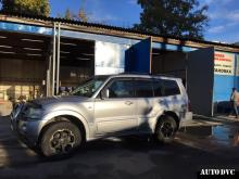 Installing a set of spacers to increase the ground clearance Mitsubishi Pajero III Lift Kits (leveling kits and coil spring spacer\strut spacer)