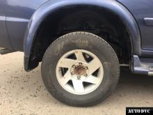 Installing a set of spacers to increase the ground clearance Mitsubishi Pajero III Lift Kits (leveling kits and coil spring spacer\strut spacer)