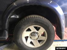 Installing a set of spacers to increase the ground clearance Mitsubishi Pajero III Lift Kits (leveling kits and coil spring spacer\strut spacer)