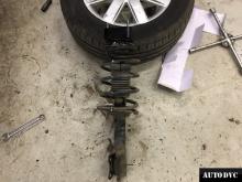 Installing a set of spacers to increase the ground clearance Nissan Almera Lift Kits (leveling kits and coil spring spacer\strut spacer)