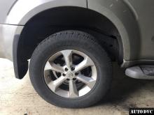Installing a set of spacers to increase the ground clearance Nissan Pathfinder Lift Kits (leveling kits and coil spring spacer\strut spacer)