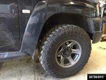 Installing a set of spacers to increase the ground clearance Nissan Patrol Lift Kits (leveling kits and coil spring spacer\strut spacer)