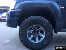 Installing a set of spacers to increase the ground clearance Nissan Patrol Lift Kits (leveling kits and coil spring spacer\strut spacer)