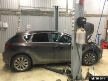 Installing a set of spacers to increase the ground clearance Opel Astra J Kits (leveling kits and coil spacer\strut spacer)