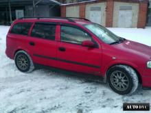 Installing a set of spacers to increase the ground clearance Opel Astra G Lift Kits (leveling kits and coil spring spacer\strut spacer)