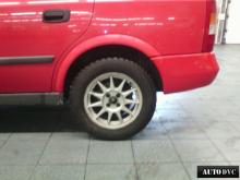 Installing a set of spacers to increase the ground clearance Opel Astra G Lift Kits (leveling kits and coil spring spacer\strut spacer)