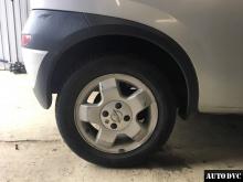 Installing a set of spacers to increase the ground clearance Opel Corsa Lift Kits (leveling kits and coil spring spacer\strut spacer)