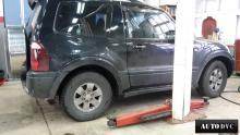 Installing a set of spacers to increase the ground clearance Mitsubishi Montero III Lift Kits (leveling kits and coil spring spacer\strut spacer)