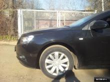 Installing a set of spacers to increase the ground clearance Chevrolet Cruze I Lift Kits (leveling kits and coil spring spacer\strut spacer)