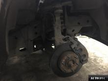 Installing a set of spacers to increase the ground clearance Chevrolet TrailBlazer Lift Kits (leveling kits and coil spring spacer\strut spacer)