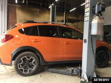 Installing a set of spacers to increase the ground clearance Subaru XV Lift Kits (leveling kits and coil spring spacer\strut spacer)