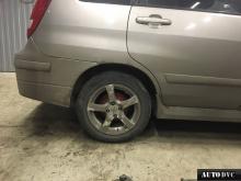 Installing a set of spacers to increase the ground clearance Suzuki Liana Lift Kits (leveling kits and coil spring spacer\strut spacer)