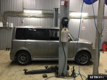 Installing a set of spacers to increase the ground clearance Toyota bB Lift Kits (leveling kits and coil spring spacer\strut spacer)