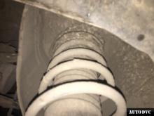 Installing a set of spacers to increase the ground clearance Toyota IQ Lift Kits (leveling kits and coil spring spacer\strut spacer)