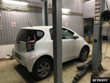 Installing a set of spacers to increase the ground clearance Toyota IQ Lift Kits (leveling kits and coil spring spacer\strut spacer)
