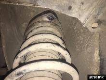 Installing a set of spacers to increase the ground clearance Toyota IQ Lift Kits (leveling kits and coil spring spacer\strut spacer)
