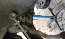 Installing a set of spacers to increase the ground clearance Toyota Estima Lift Kits (leveling kits and coil spring spacer\strut spacer)