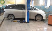 Installing a set of spacers to increase the ground clearance Toyota Estima Lift Kits (leveling kits and coil spring spacer\strut spacer)