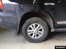 Installing a set of spacers to increase the ground clearance Toyota Land Cruiser 200 Lift Kits (leveling kits and coil spring spacer\strut spacer)