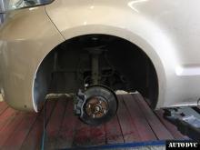 Installing a set of spacers to increase the ground clearanceToyota Porte I Lift Kits (leveling kits and coil spring spacer\strut spacer)