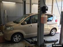 Installing a set of spacers to increase the ground clearanceToyota Porte I Lift Kits (leveling kits and coil spring spacer\strut spacer)