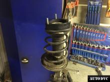 Installing a set of spacers to increase the ground clearance Toyota Prius Lift Kits (leveling kits and coil spring spacer\strut spacer)